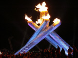 Spectators Surround the Olympic Flame at the Vancouver 2010 Olympics