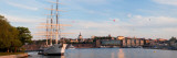 Buy Schooner at Harbor with a City in Background with Hot Air Balloons in Sky, Stockholm, Sweden at AllPosters.com