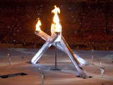Standing with the Burning Olympic Cauldron at the Opening Ceremonies for the 2010 Winter Games