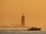 Buy Lobster Boat Passes Ram Island Ledge Light at Dawn Off Cape Elizabeth, Maine at AllPosters.com