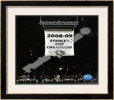The Pittsburgh Penguins raise their 2008-09 Stanley Cup Champions Banner