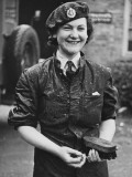 A Wet Waaf Woman Who Was Cleaning a Lorry During World War Ii