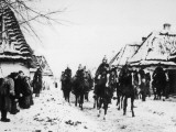 Austrian Cavalry Advance Through a Polish Settlement on the Eastern Front