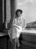 An Elegant Woman Sits on a Wall at the Villa Falconieri, Frascati, Italy