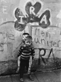 Two Dirty Boys Stand in Front of Ira Graffiti in Northern Ireland