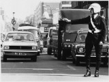 Traffic Police Officer Directing Traffic in London Metropolitan Police