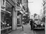 A Smartly Dressed Lady Strides Along Bond Street Whilst on a Shopping Trip Photographic Print