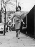 A Woman Walks Joyfully Down the Street