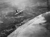 D-Day - Bomber Giving Air Support to Infantry Invasion