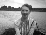 Photograph of a Woman on a Rowing Boat