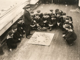 A Group of British Navy Cadets are Taught to Navigate