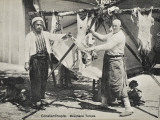 A Turkish Butcher Skinning a Sheep in Constantinople