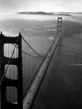 Car Lanes across the Golden Gate Bridge with Fog-Covered City of San Francisco in Background Premium Photographic Print