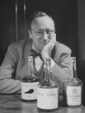 Mayor Charles Farnsley Sitting in His Office with Bottles of His Kentucky Straight Bourbon Whiskey