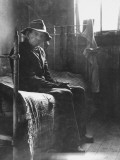 Buy Old Man Sitting Patiently on Old Iron Bed as He Waits for Mealtime at Poor House in Perry County at AllPosters.com
