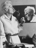 Buy Violinist Olga Rudge, Longtime Lover of Poet Ezra Pound, at her Desk in Front of a Photo of Him at AllPosters.com