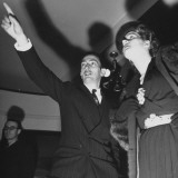 Artist Salvador Dali Talking with Unidentified Woman