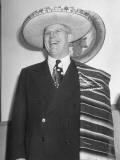 Buy Governor Earl Warren of California Wearing Serape and Hat Given to Him During Visit to Texas at AllPosters.com