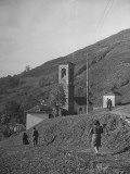 People Going to Church, Frontier Guard Observing, Hills in the Background Is the Italian Border