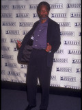Actor Morgan Freeman Standing and Holding Jacket Open at Vh1 Honors