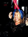 Actress Suzanne Somers with Buttmaster Exercise Contraption Clamped across Her Head