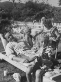 Leroy Leffler, Who Earns $3000 a Year, Relaxing on Lounge Chair in His Yard with Family