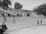 Parisians Enjoying Afternoon in Park Below Sacre Coeur Church in Montmartre