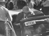 Buy Governor "Big Jim" Folsom Kissing a Woman from a Beauty Contest in His Car at AllPosters.com