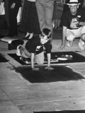 Child Actor Charlie Korsmo, "Kid" in "Dick Tracy," Making Hand Prints in Cement at Premiere