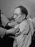 Buy Doctor Examining Non-Cancerous Growth on Patient's Shoulder at AllPosters.com