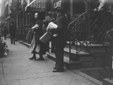Selling Newspapers Outside the US Hotel Building at the Corners of Fulton and Pearl Streets