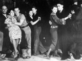 Construction Workers and Taxi Dancers Enjoying a Night Out in Barroom in Frontier Town Premium Photographic Print