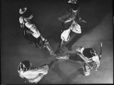 Four Men Demonstrating Steps of Ukrainian Cossack Sword Dance