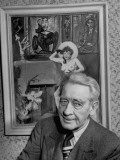 Buy James Montgomery Flagg Sitting in Front of One of His Paintings at AllPosters.com