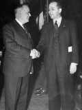 Sam Jones and William Green Shaking Hands During the Convention Premium Photographic Print