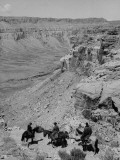 Horsemen Riding Down Shelf of Grand Canyon
