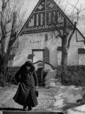 Buy Woman Walking in Front of Old Church at AllPosters.com