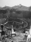 Men Constructing a Pool by Paddock Swimming Pool Company