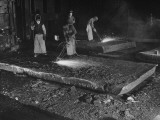 Workers Torch-Scarfing an Armor Plate