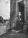 Painter Lauren Ford Talking to Nun and Writing in Notebook