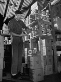 Buy Robert Kirkland Sorting Cans of Auto Grease at AllPosters.com
