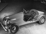 A Two Seater Custer Car Being Sold at F.A.O. Schwarz