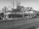 Buy Outside of George Higgins Pontiac Dealership at AllPosters.com