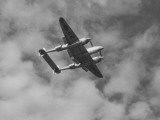 A P-38 Fighter Plane Soaring Through the Air