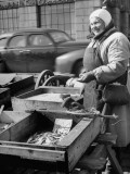 Buy Woman Buying Fish at Market at AllPosters.com