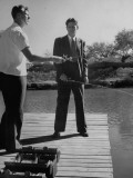 Buy Gordon Carpenter Wearing a Suit While Fishing at AllPosters.com