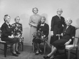 Ariel Sextet Vocal Group Sitting and Standing