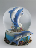Buy Close-Up of Figurines of Dolphins in a Snow Globe at AllPosters.com