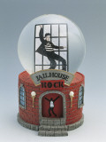 Close-Up of a Figurine of Elvis Presley Dancing in a Snow Globe