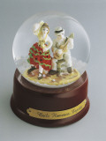 Close-Up of Figurines of Dancers in a Snow Globe